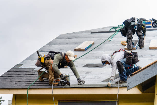 Professional Roofing technician working in Portland, OR